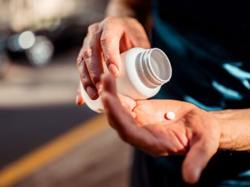 Best men’s health supplements 2025 on Amazon, multivitamin and probiotic bottles with fitness props